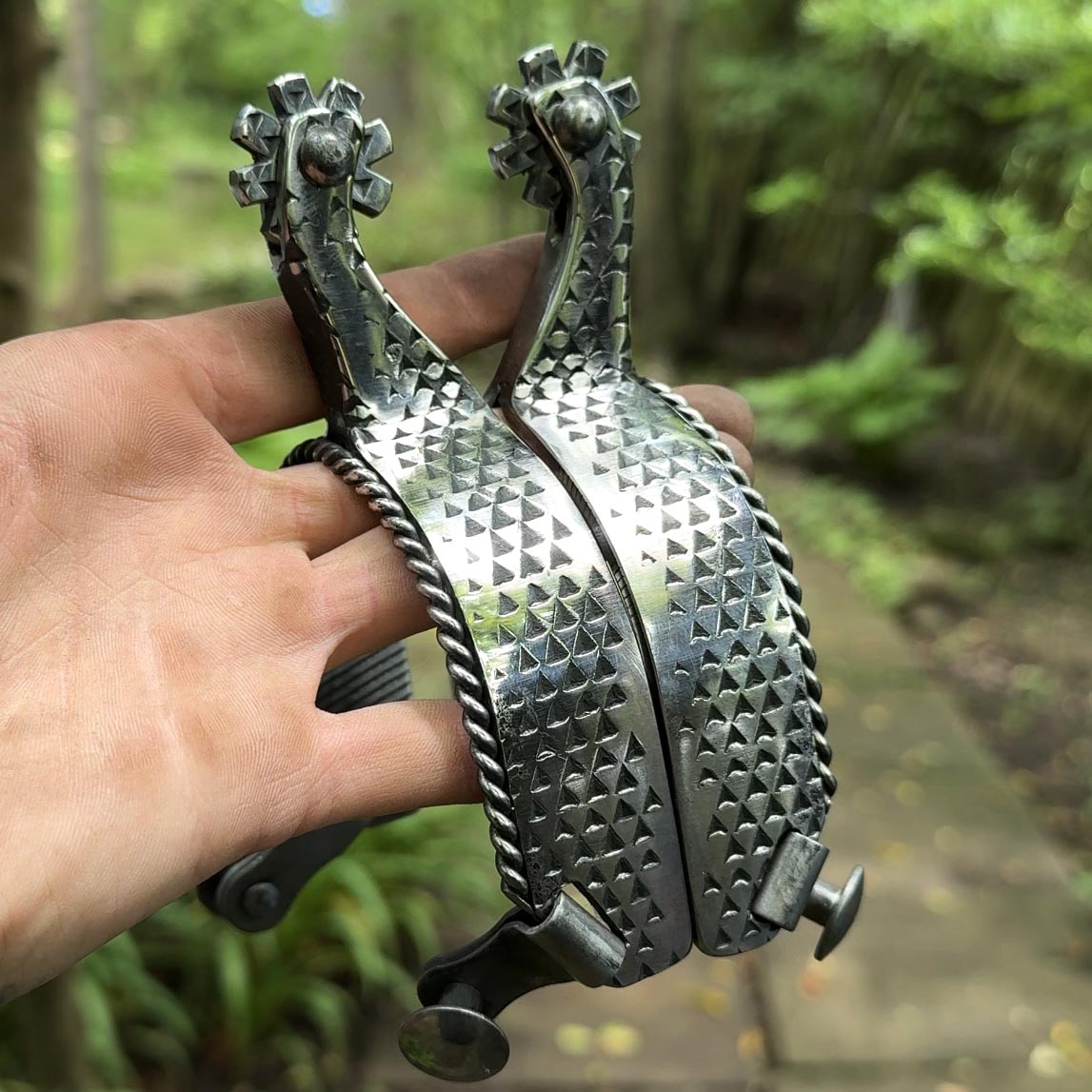 One-Piece Rasp Spurs with Rope Accent